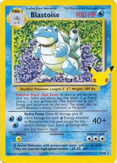 Blastoise card: Blastoise stands with its shell cannons raised against a holographic background.